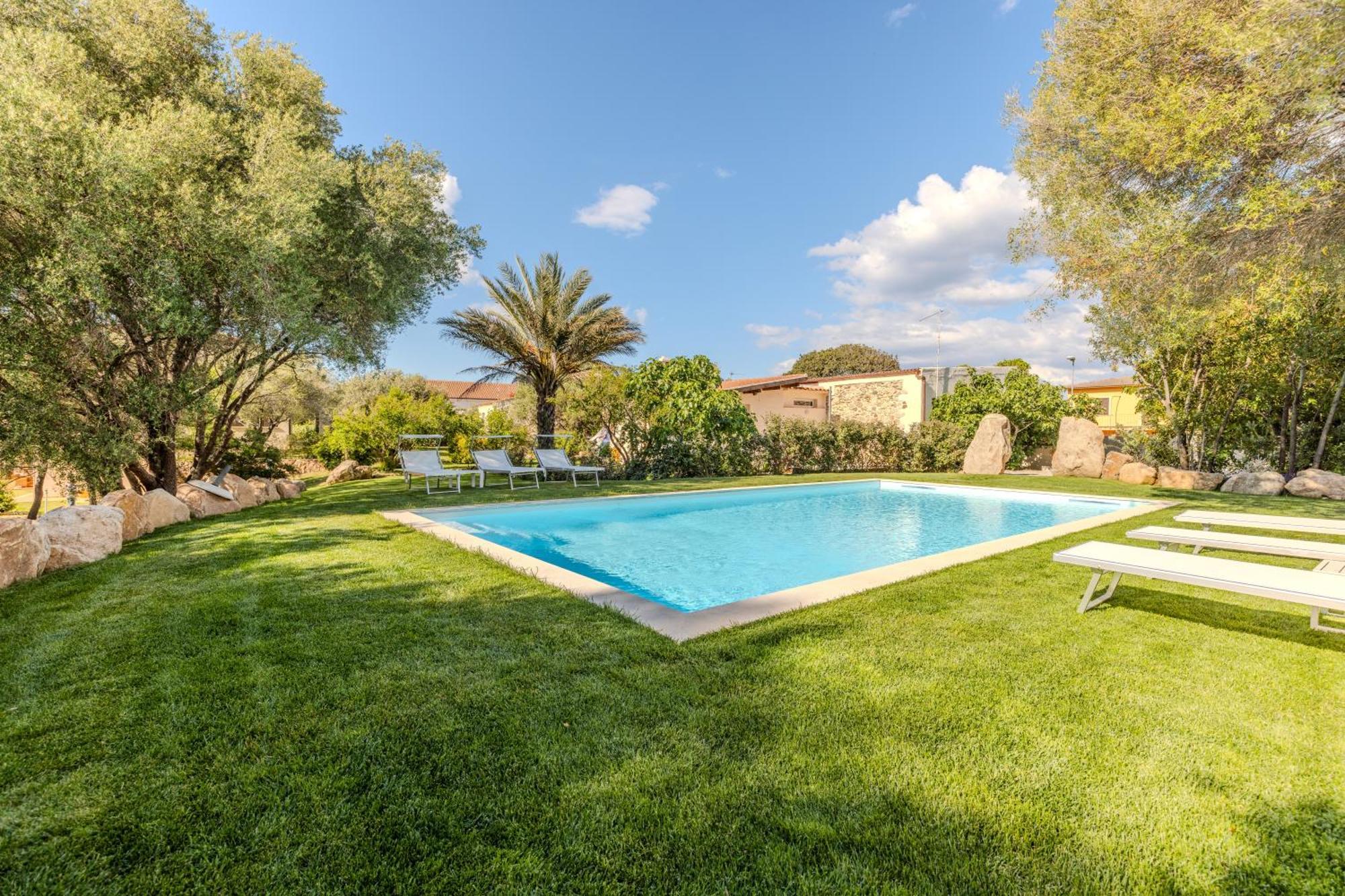 Stazzo San Teodoro Il Ginepro Piscina Condivisa Daire Dış mekan fotoğraf