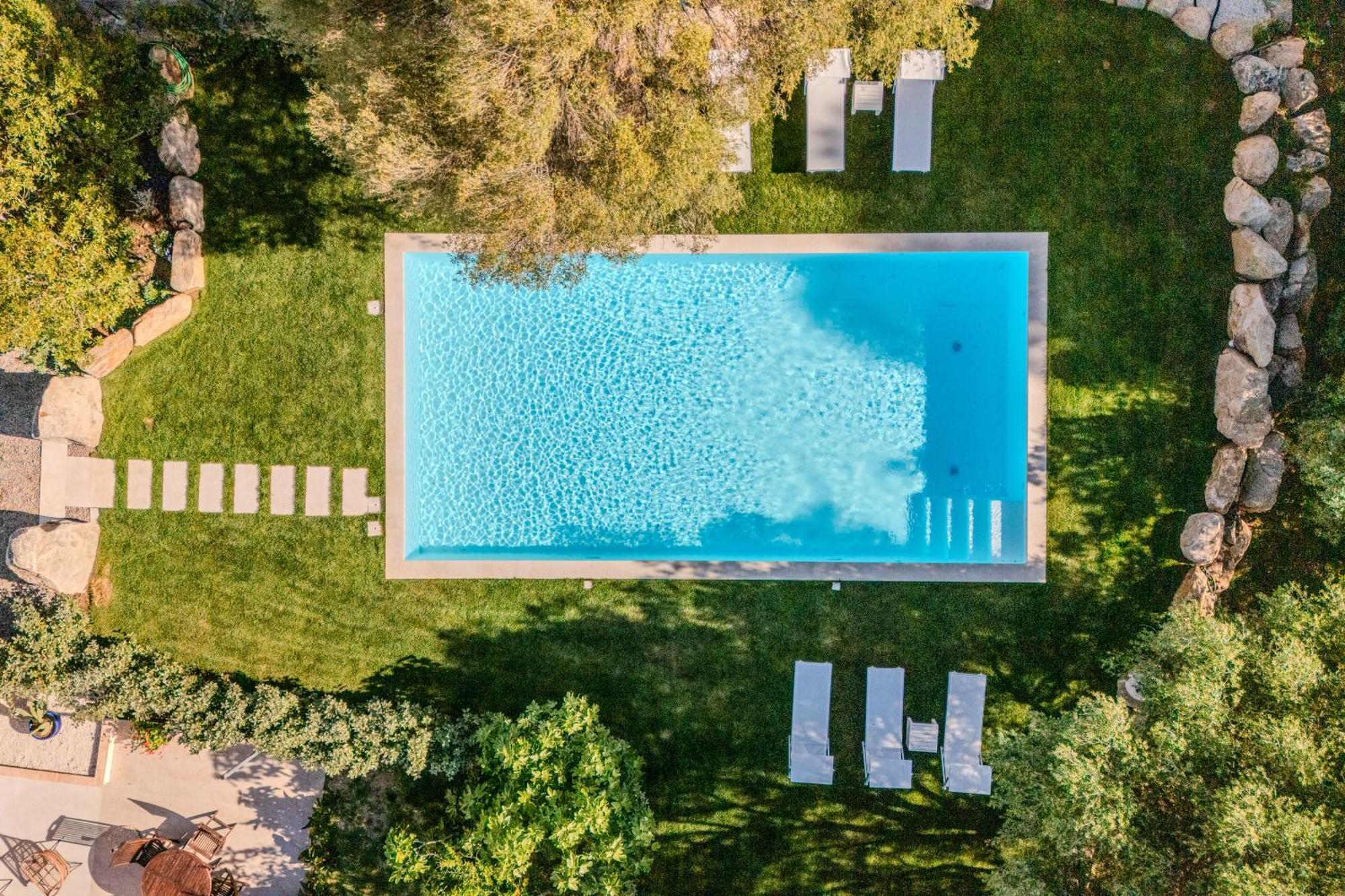 Stazzo San Teodoro Il Ginepro Piscina Condivisa Daire Dış mekan fotoğraf